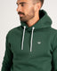 Donkergroene ingetogen hoodie